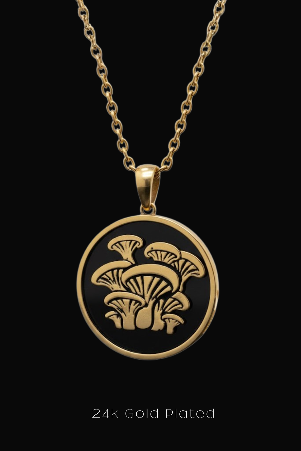 A gold-plated pendant necklace with a circular design featuring a mushroom motif.