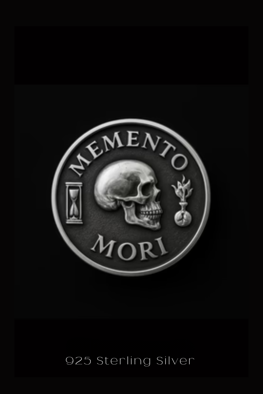 The image is a silver coin with the Latin motto "Memento mori" (which means "Remembering the dead" in English) inscribed on it. The coin is set against a black background, and the phrase "925 Sterling Silver" is written at the bottom of the image.