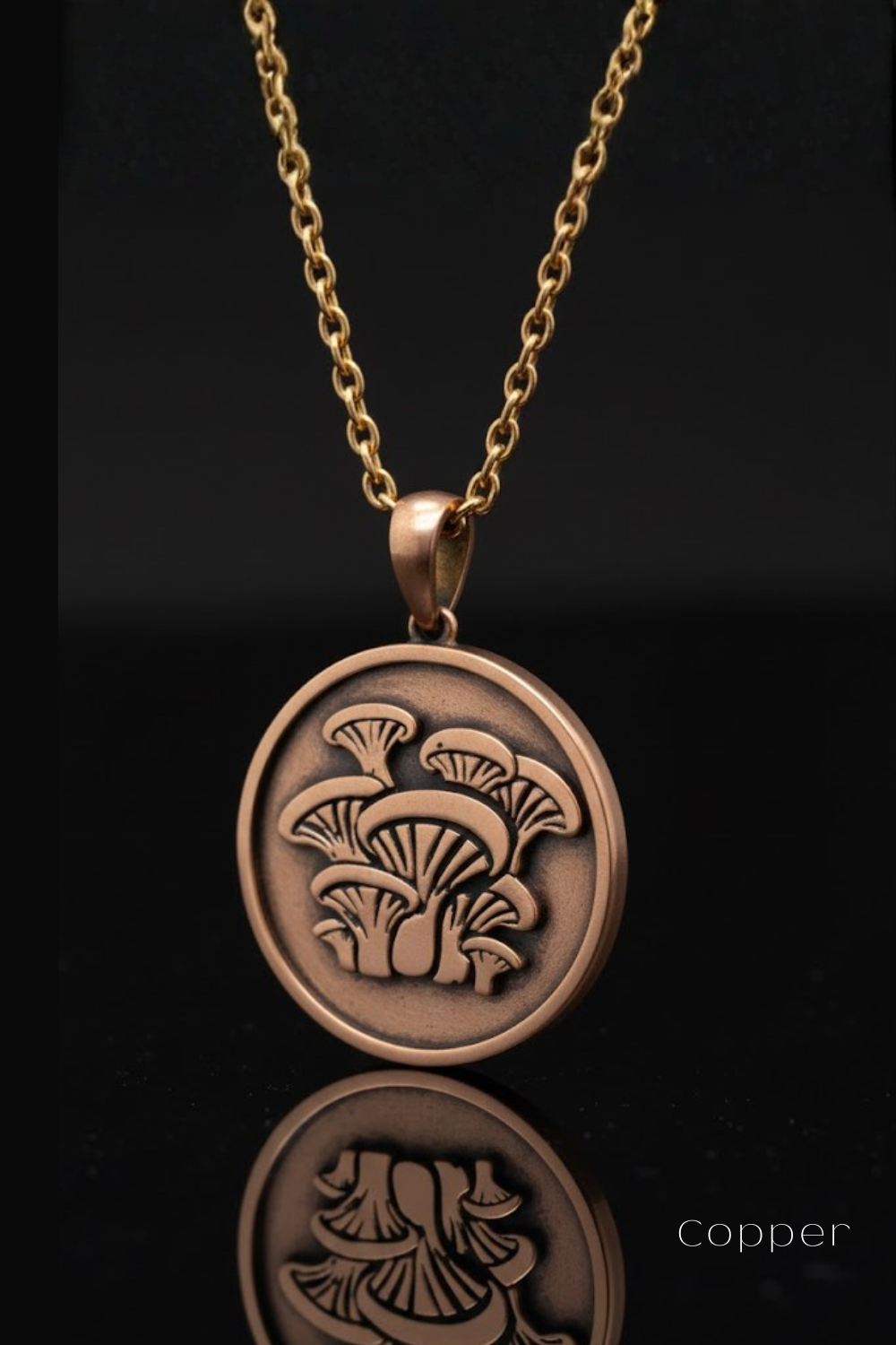 A copper-colored pendant necklace with a circular medallion featuring a mushroom design.