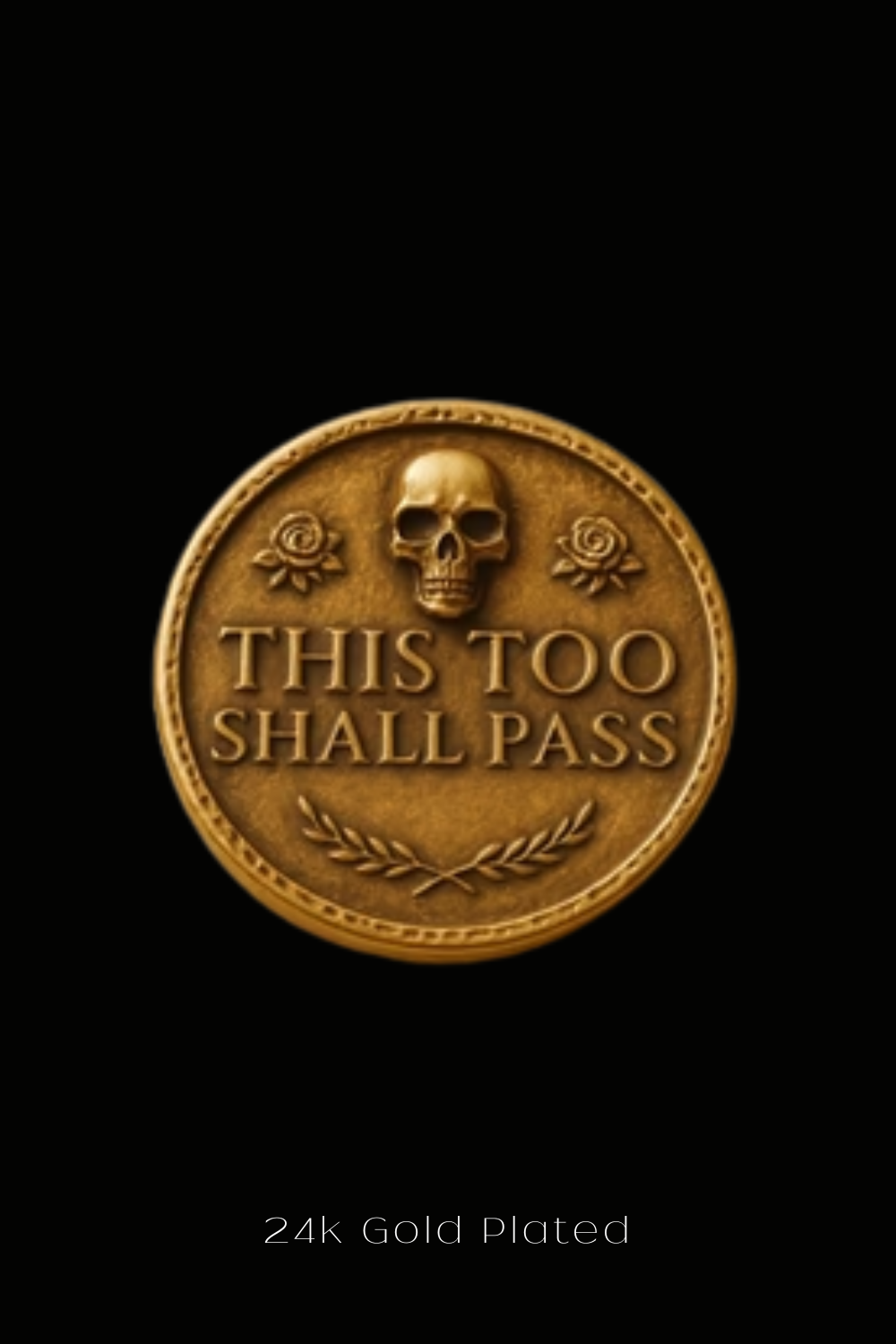 The image is a 24k gold-plated coin with a skull and rose design, and the text "THIS TOO SHALL PASS" on it.