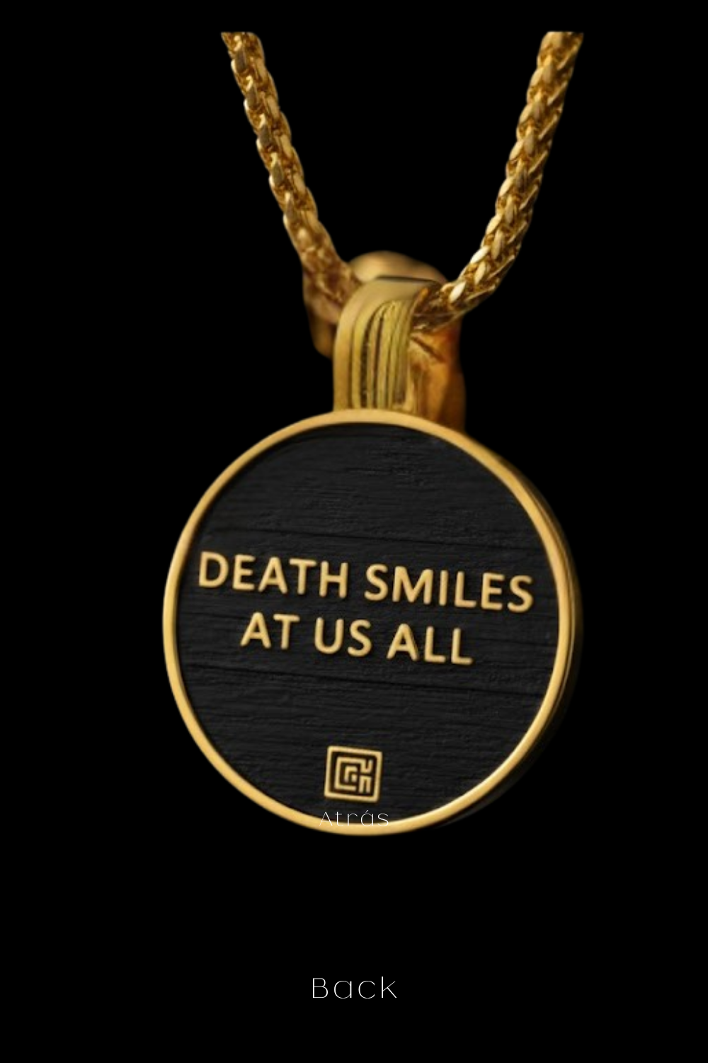 a gold-colored pendant with the text "DEATH SMILES AT US ALL" on it, set against a black background.