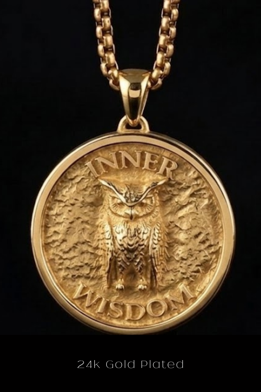 A 24k gold plated pendant featuring an owl engraved on a circular medallion.