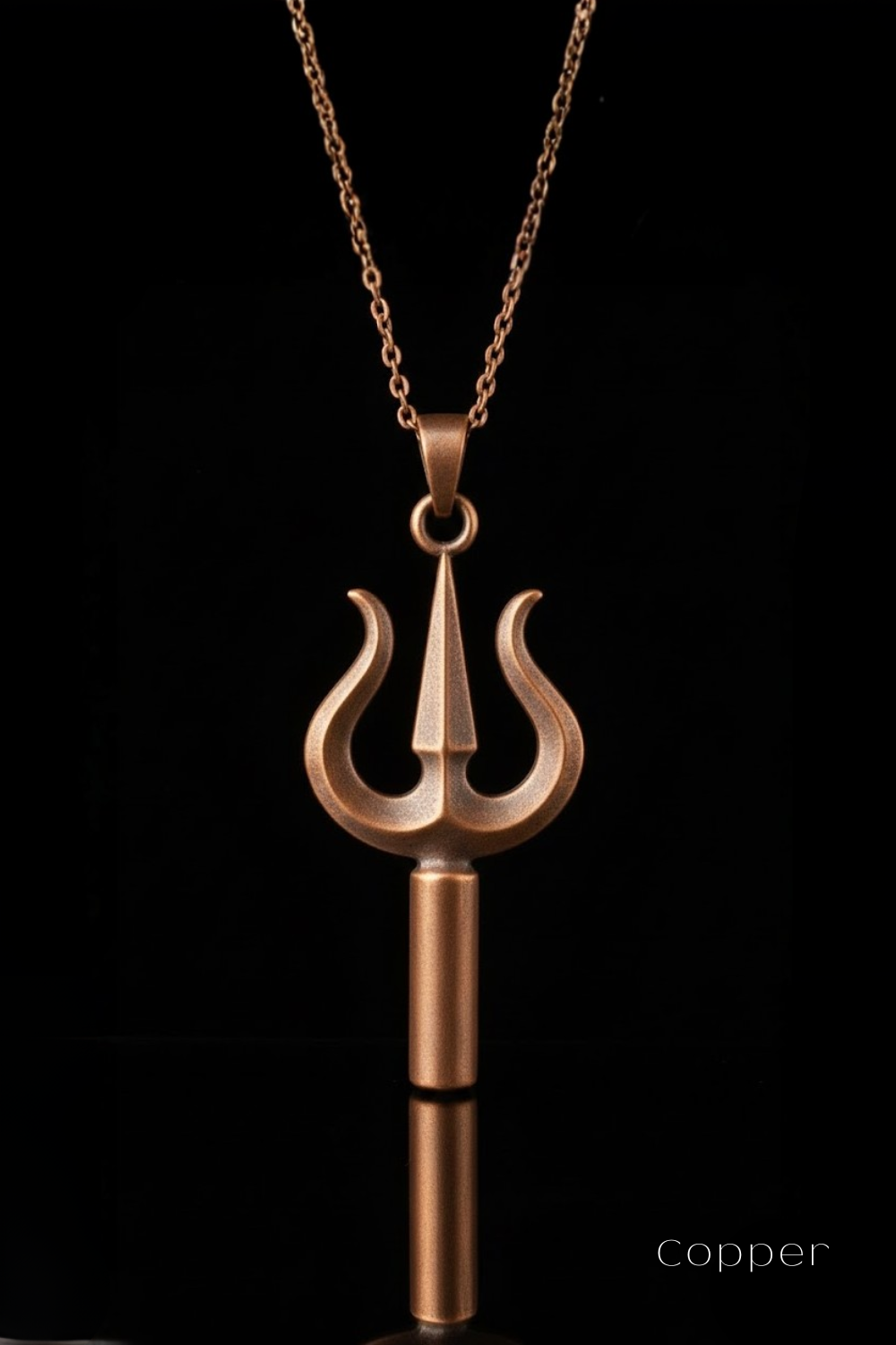 A copper-colored pendant necklace with a unique design, featuring a central spike-like element surrounded by two curved arms.