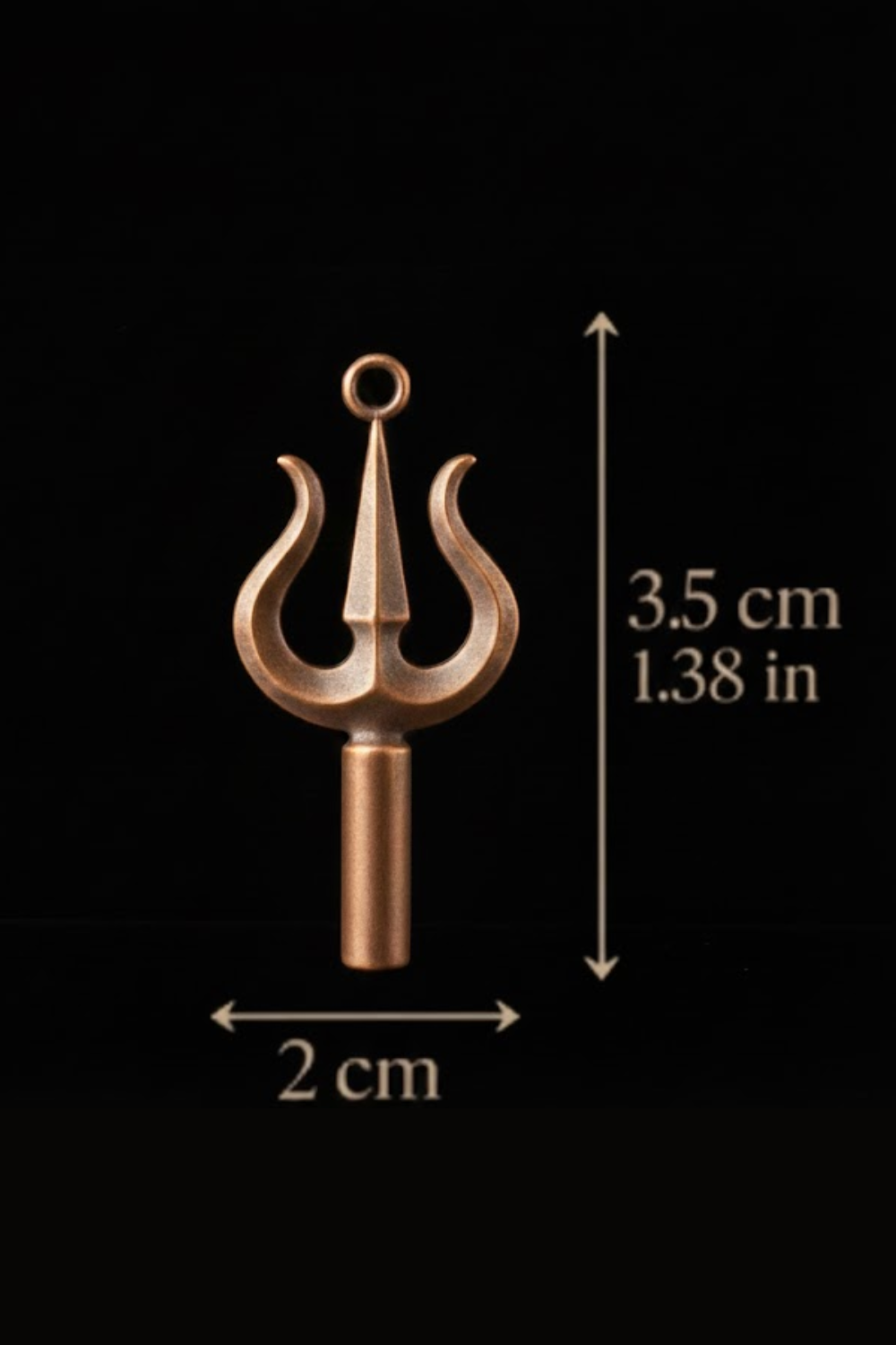 a small, metallic trident-like object with a pointed top and two curved blades, against a black background.