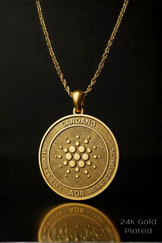 A 24K gold-plated pendant necklace with a circular medallion featuring the Cardano token design.