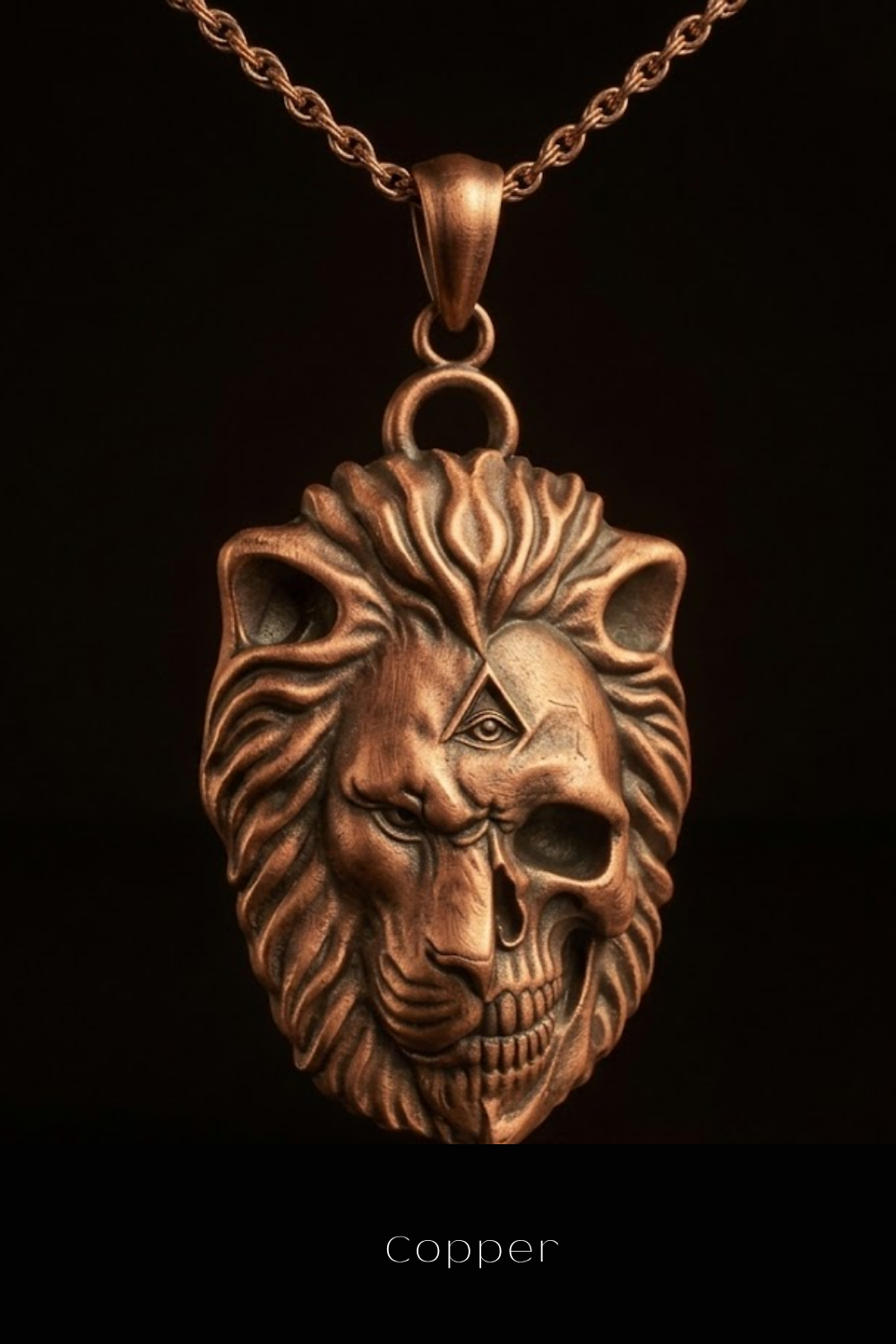 A copper-colored pendant in the shape of a lion's head with a skull-like design, suspended from a chain.