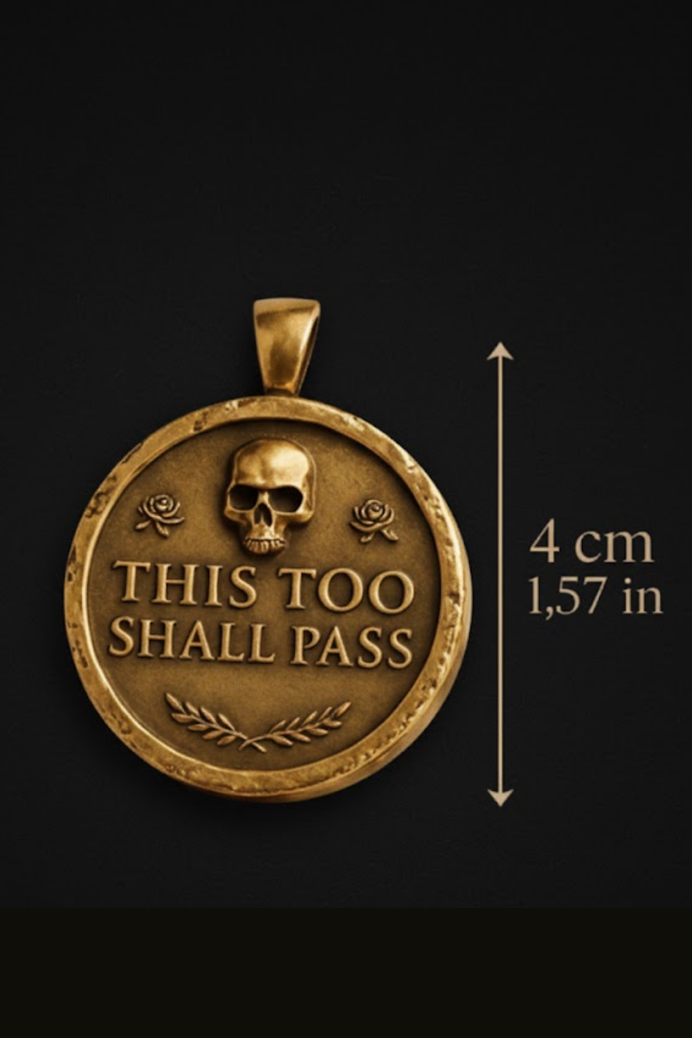 A gold-colored pendant with a skull and rose design, and the text "THIS TOO SHALL PASS" on it.