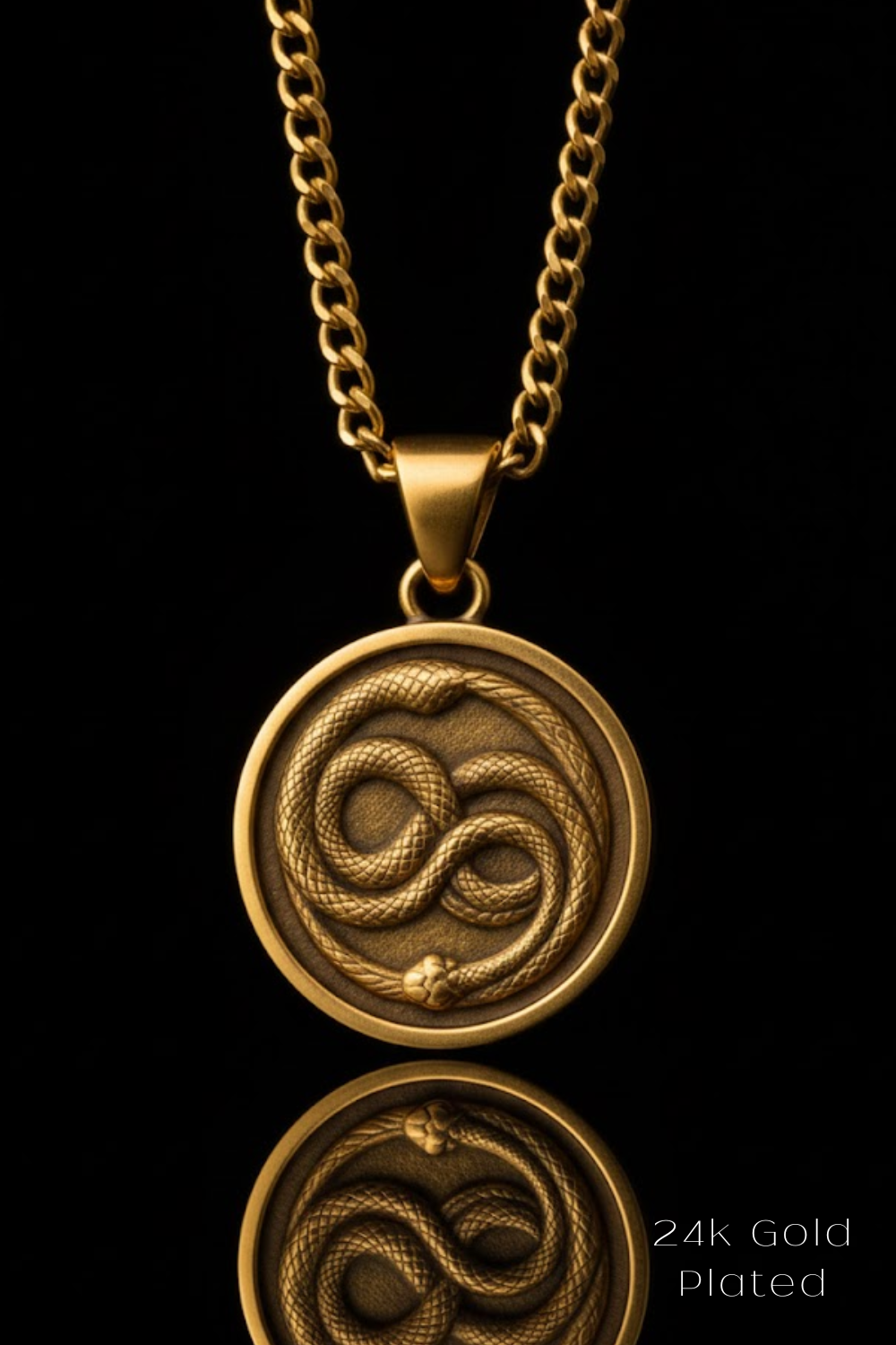 A gold-colored pendant necklace with a circular medallion featuring a snake design.