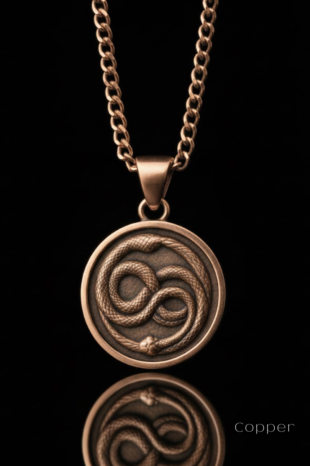 A copper-colored pendant necklace with a circular medallion featuring a snake design.