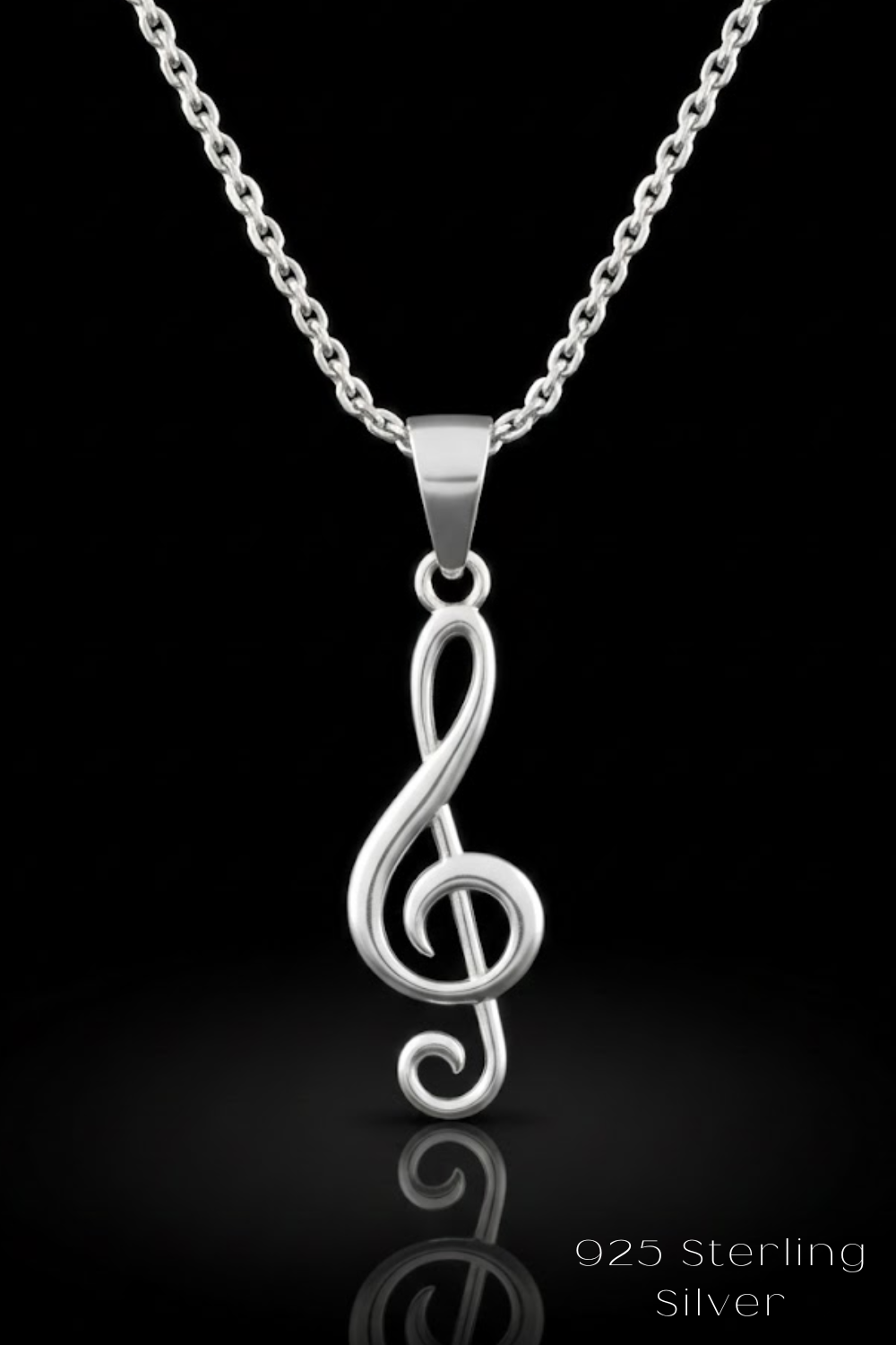 A silver musical note pendant on a silver chain necklace against a black background.
