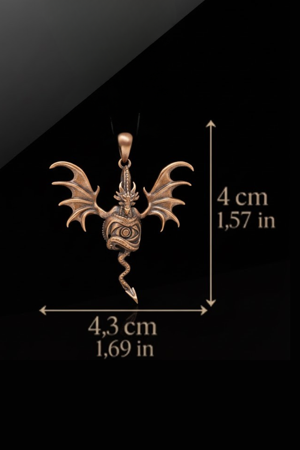 A detailed image of a dragon pendant with wings and a tail, accompanied by measurements indicating its size.